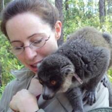 Associate Professor Francine Dolins with a brown lemur