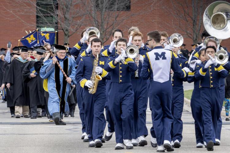 Michigan Marching Band leads procession into the Fieldhouse.