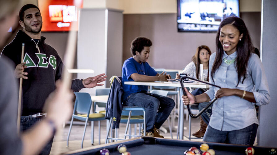 UM-Dearborn students play pool at The Union