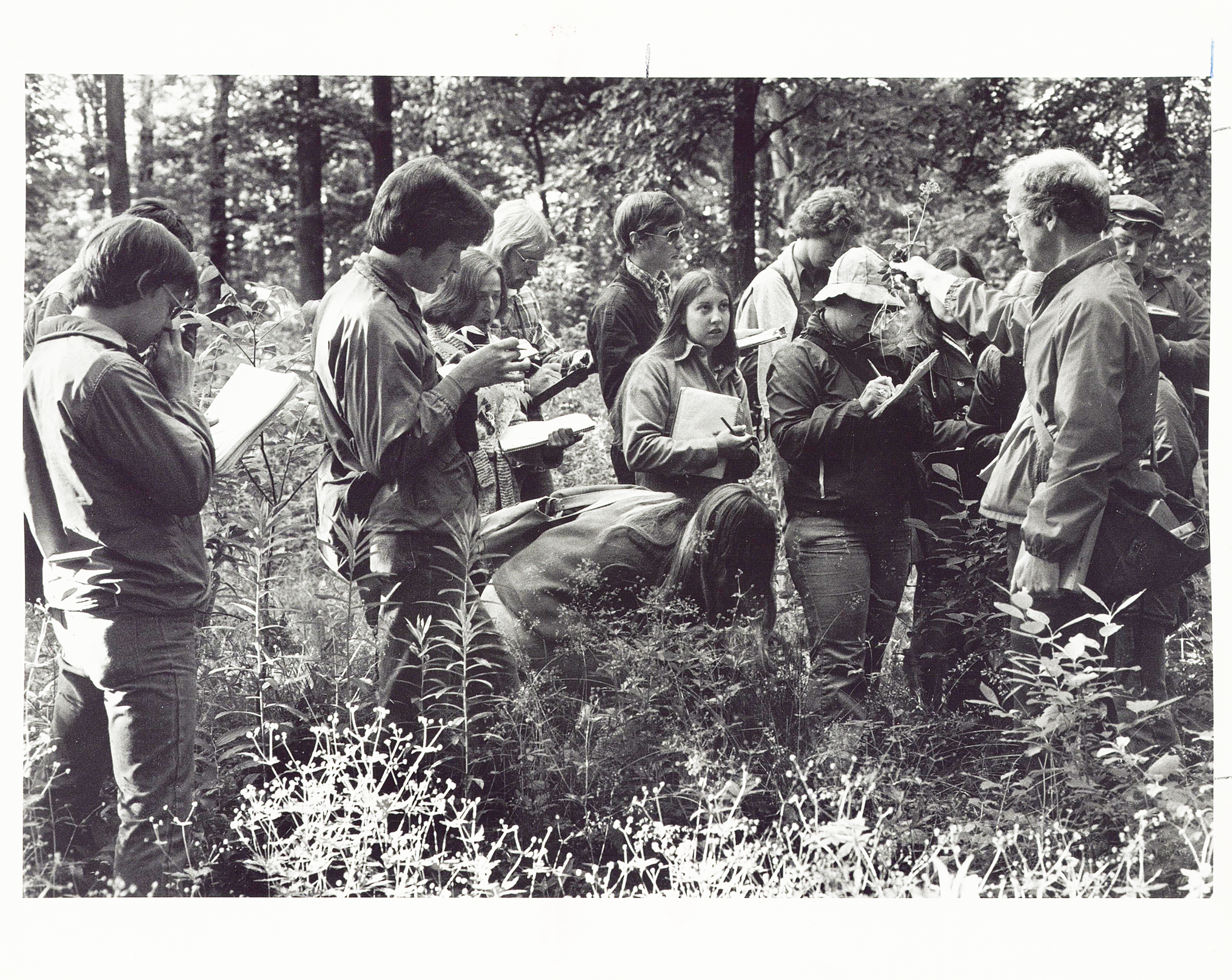 Dr. Gelderloos with students in the field