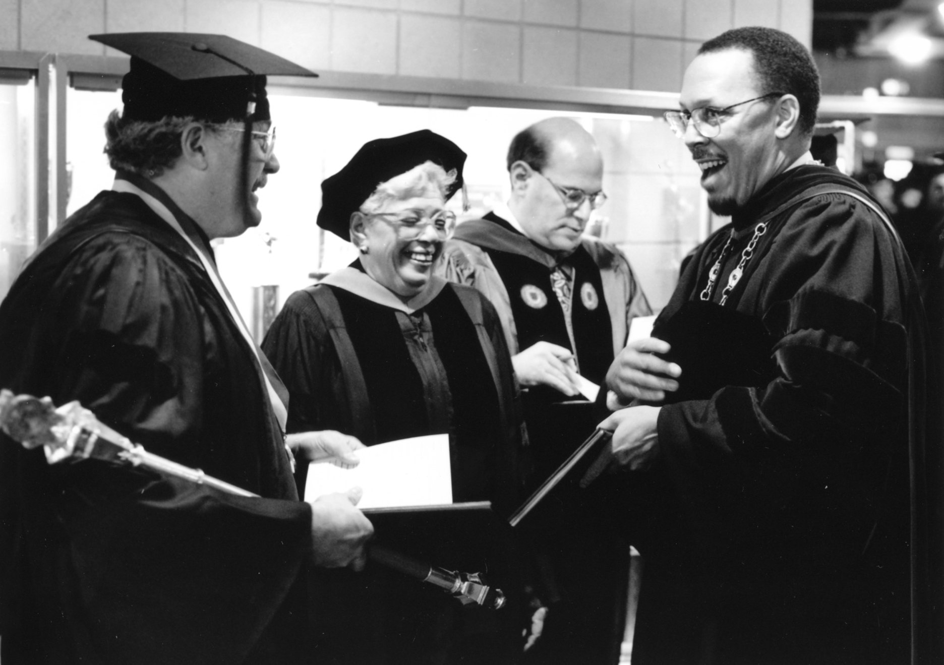 Photo of December 1993 commencement. Chancellor James Renick is on the far right