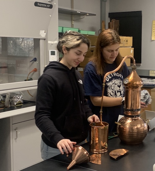  Students use copper alembic stills in Benore's biochem lab. 