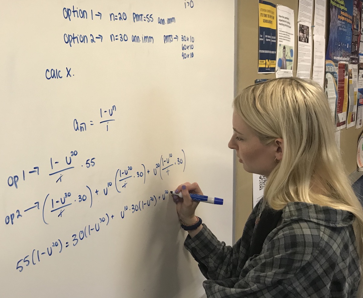  Junior Sarah McCann works on mathematical formulas. 