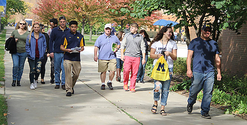 Students and parents on a tour of campus.