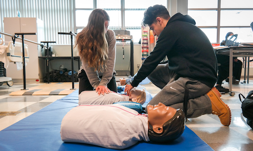  Fordson High School seniors practice CPR in a health sciences course at the Career and Technical Education Center in Dearborn. 