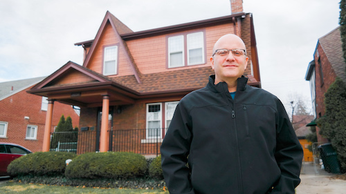  UM-Dearborn Political Science Professor Dale Thomson in front of his home in Northwest Detroit. 