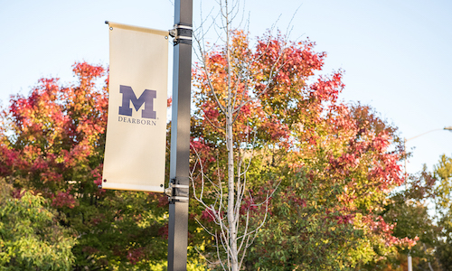 UM-Dearborn banner on campus.