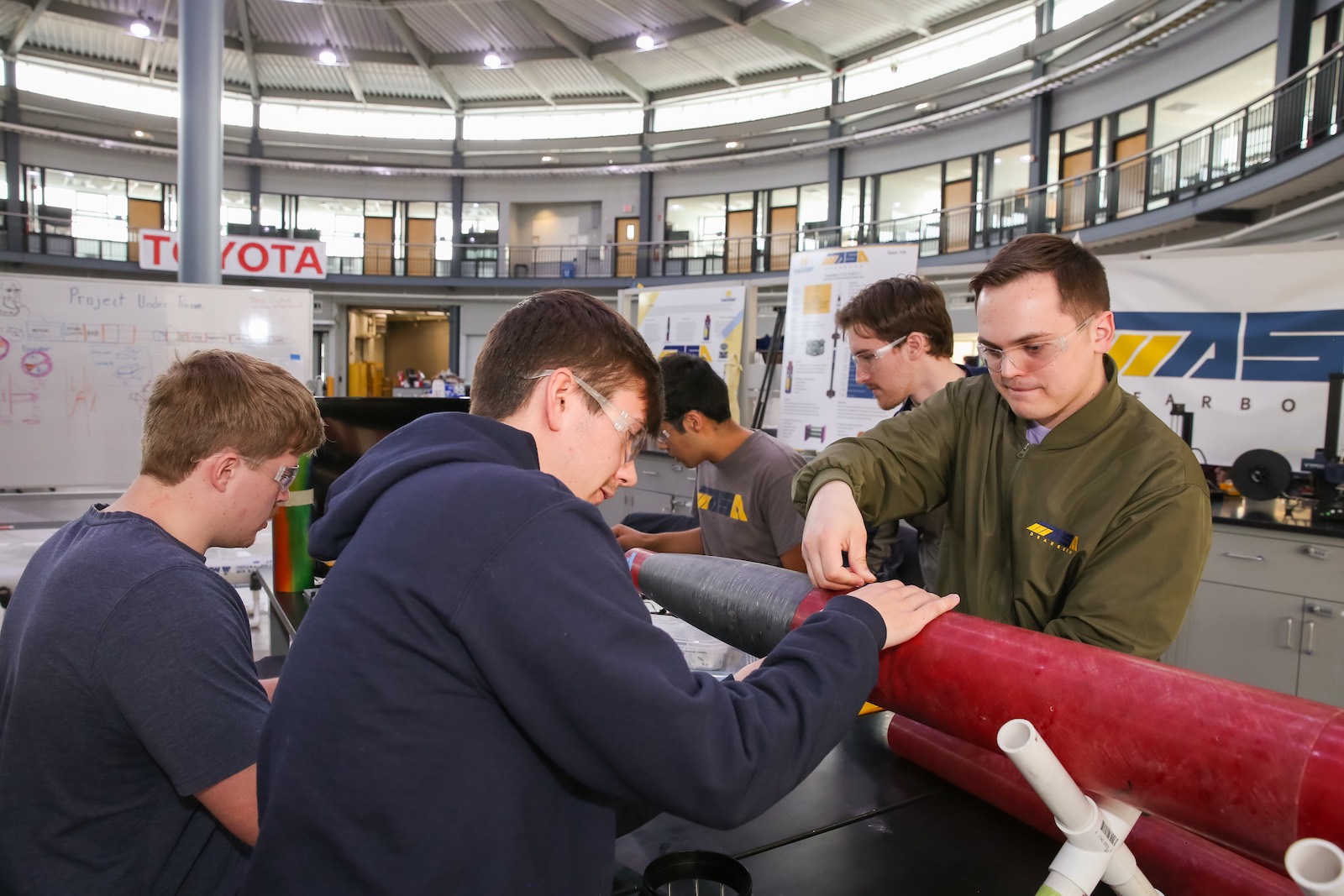 Photo of MASA students working on a rocket in the IAVS