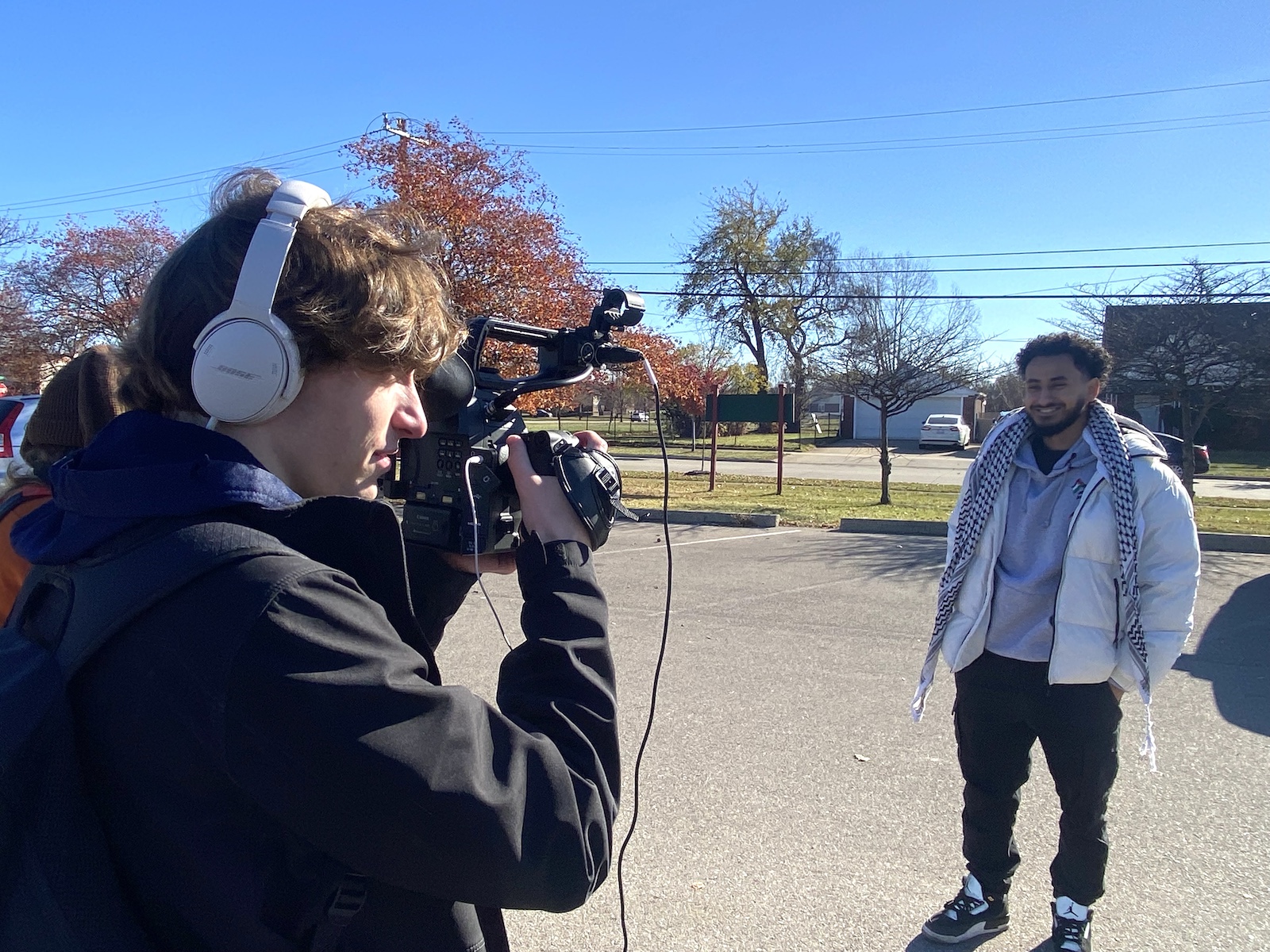 Aaron Vensko in Adam Sekuler's filmmaking course. He's filming local rapper Esa Mighty