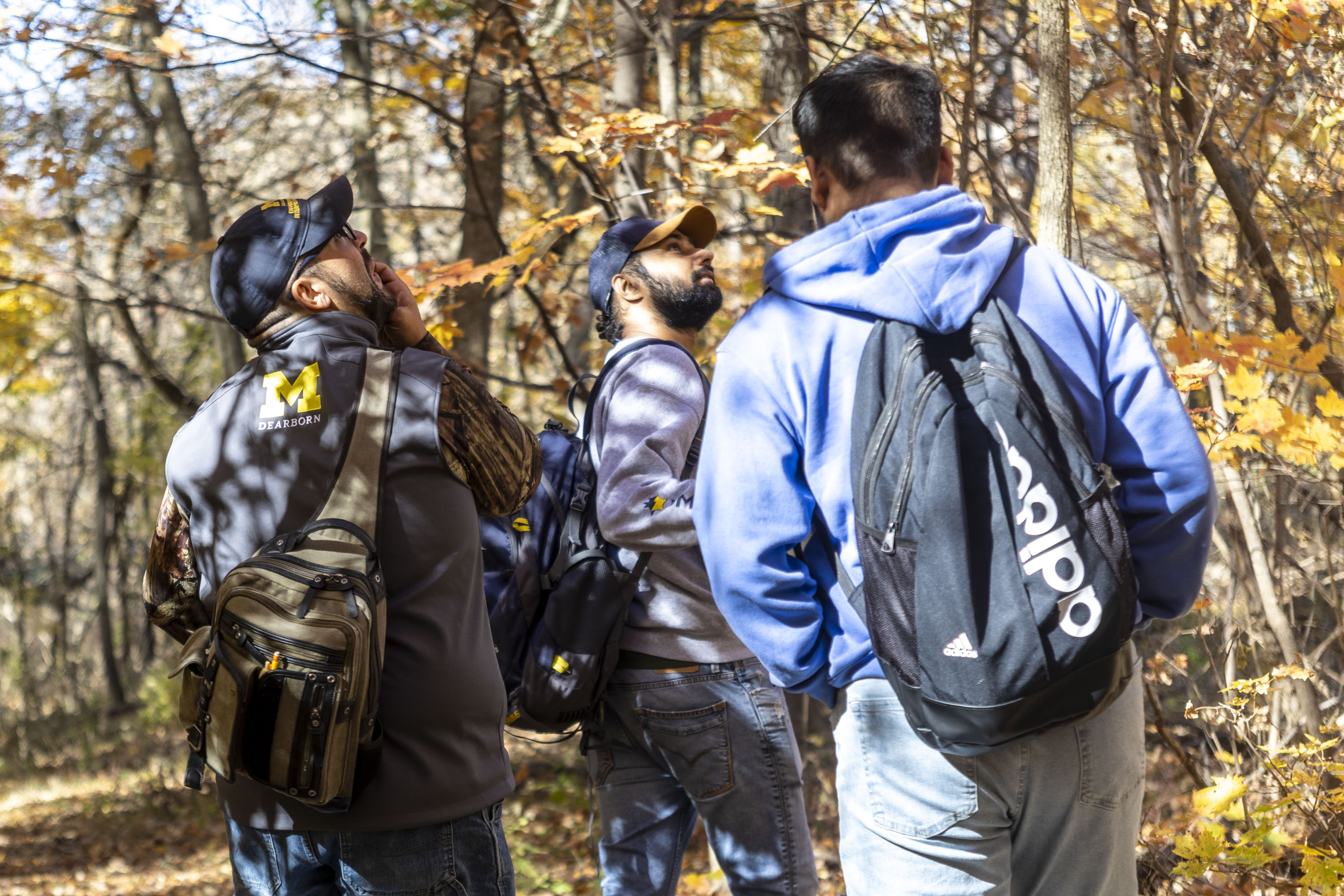 Students walking on an EIC trail in the fall