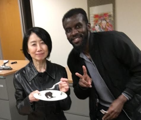 Photo of Emily Wang and Arnaud Shyaka 