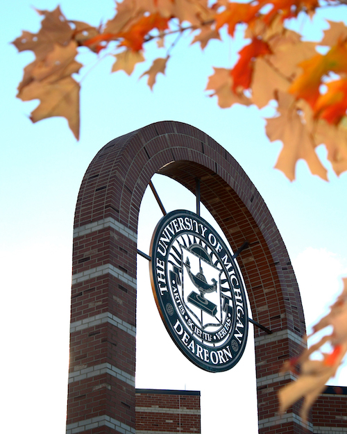 UM-Dearborn seal within campus building during the Fall.