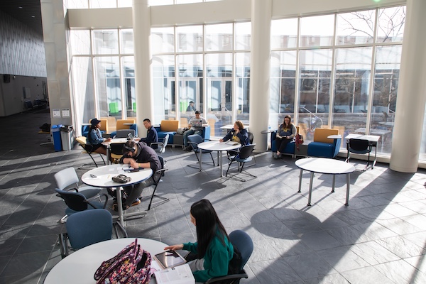 Students in the CASL building atrium.