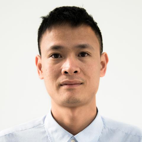 A head-and-shoulders photo of a male professor.