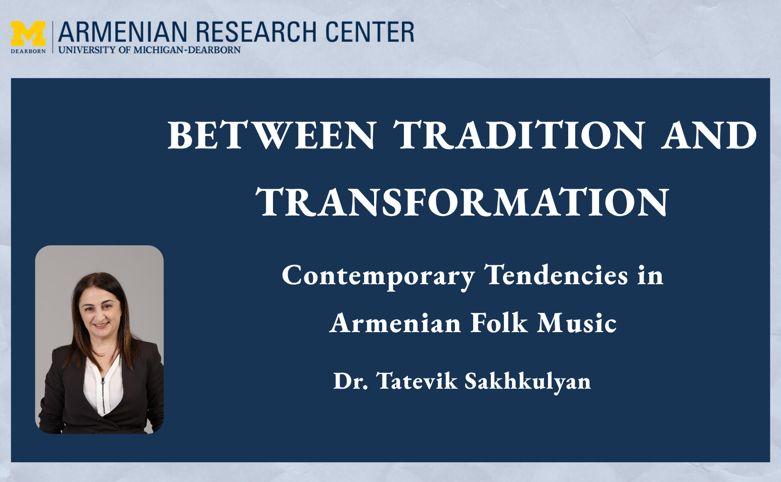 The image features a dark blue rectangular banner on a light gray textured background. Inside the banner, white text displays the lecture title: "BETWEEN TRADITION AND TRANSFORMATION: Contemporary Tendencies in Armenian Folk Music" by Dr. Tatevik Shakhkulyan.  To the left of the text is a small, framed portrait of Dr. Shakhkulyan, a woman with dark hair wearing a dark blazer and a white blouse. The university logo is positioned in the top-left corner.