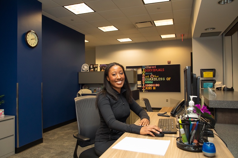 Smiling staff member at UM-Dearborn