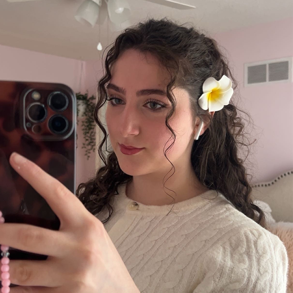 Person taking a selfie with a phone.