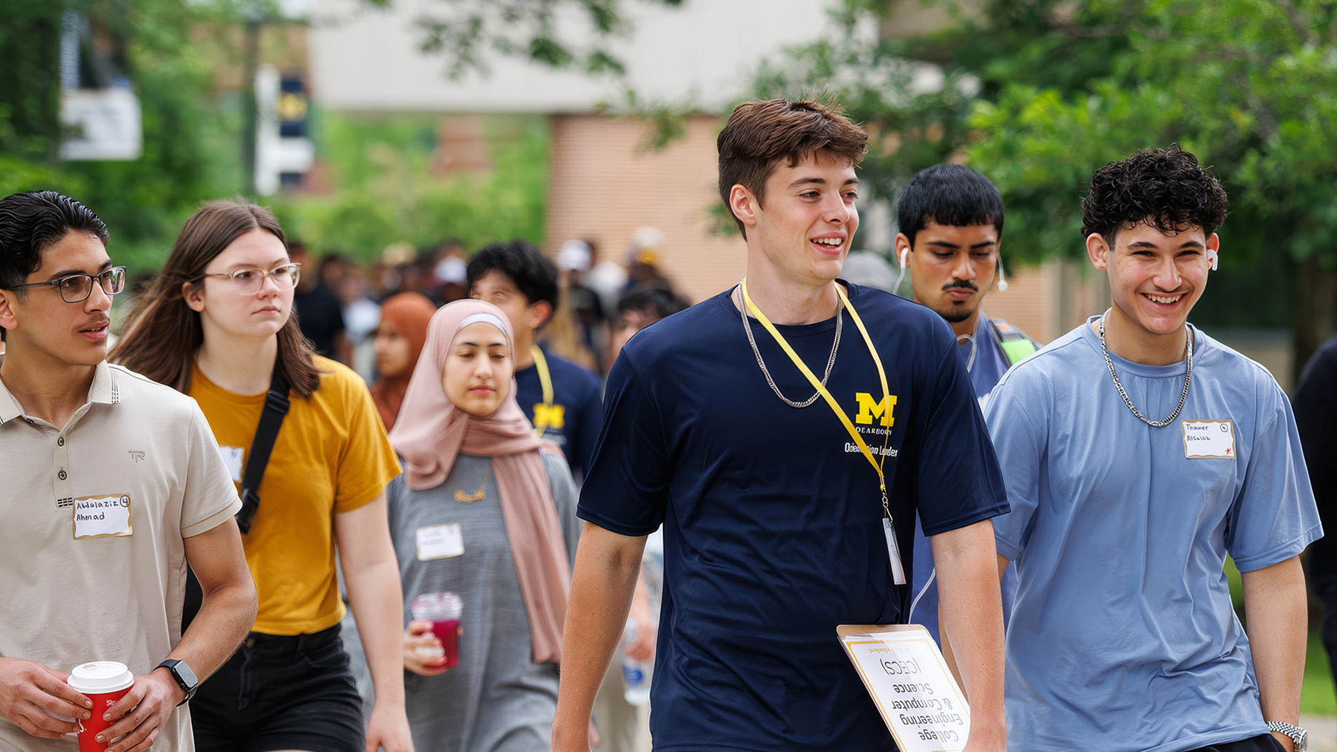 A group of UM-Dearborn students walks through campus.