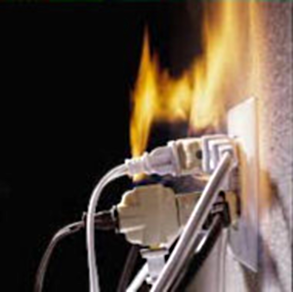Overloaded electric outlet fire