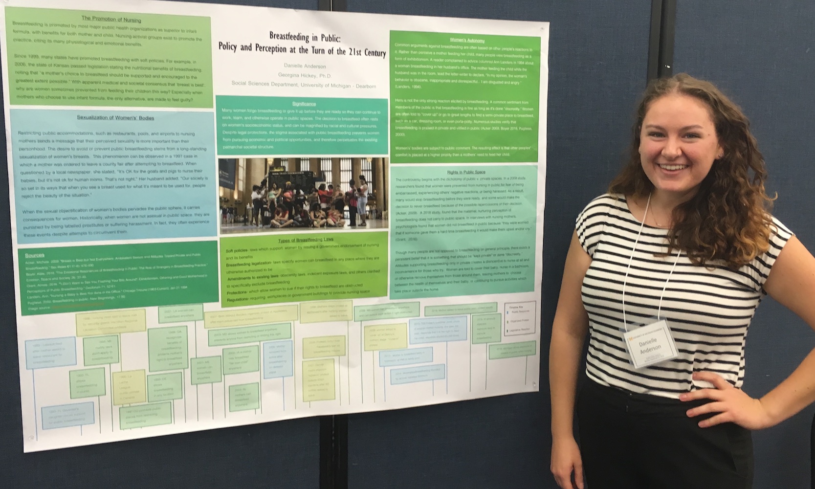 Senior Danielle Anderson standing in front of her research poster