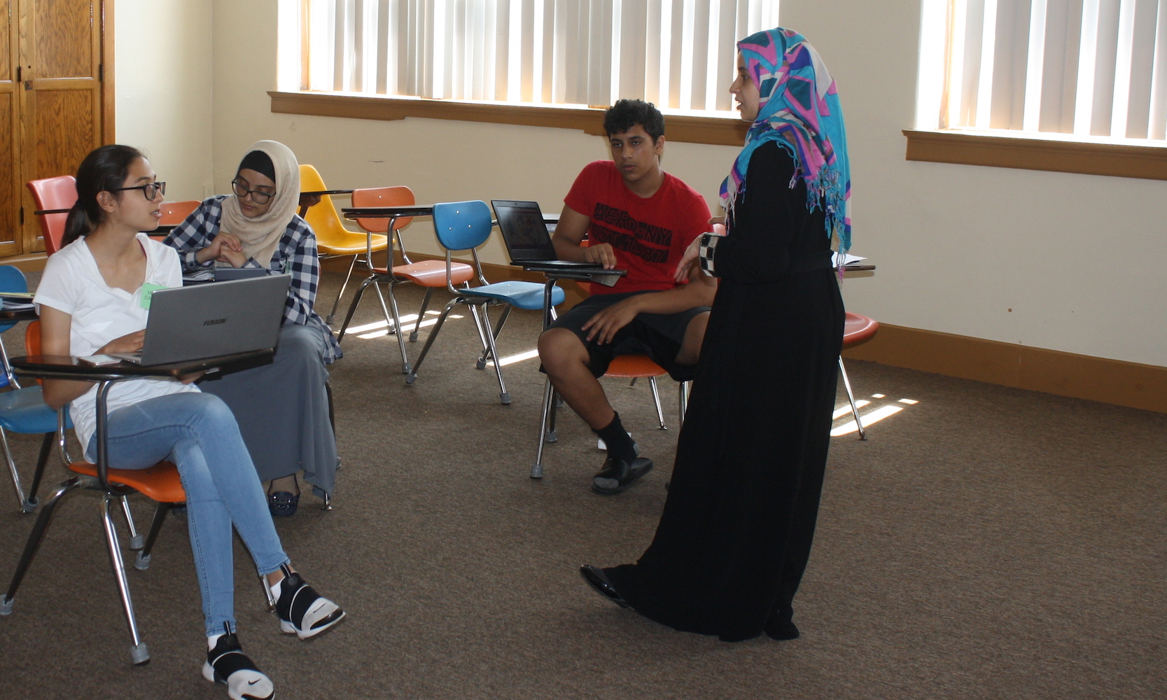 Karima Alwishah speaks to EHRA academy high school students about ways that they can be environmental justice advocates.