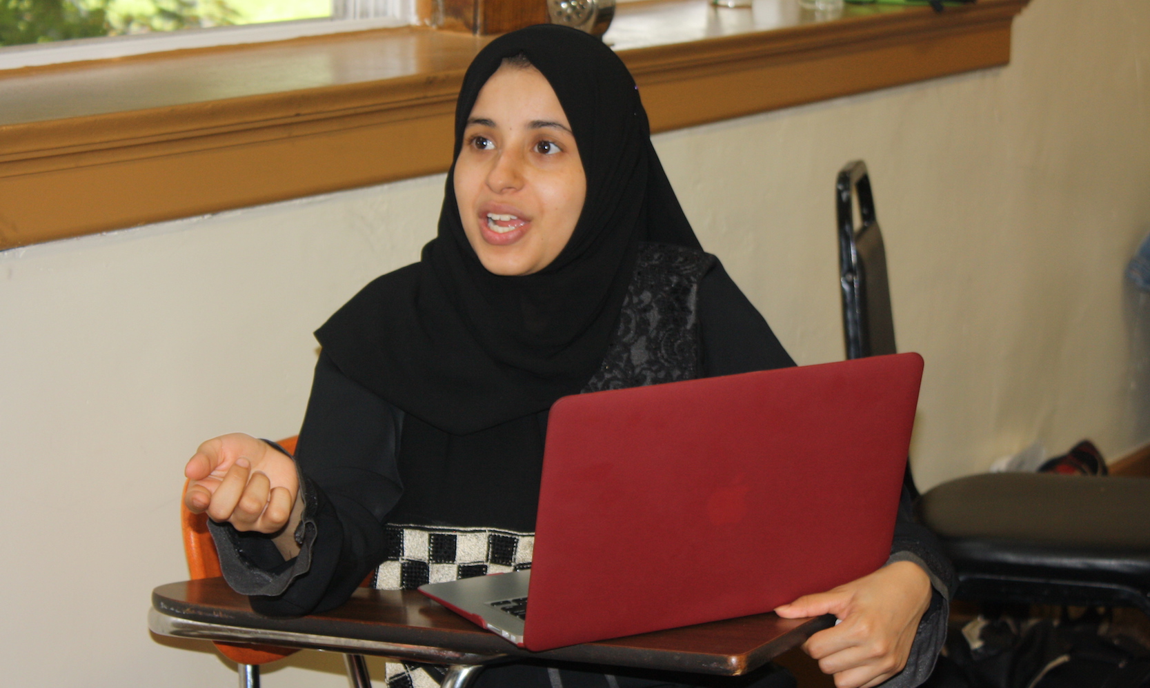 Karima Alwishah speaks to the EHRA academy students about her experience.