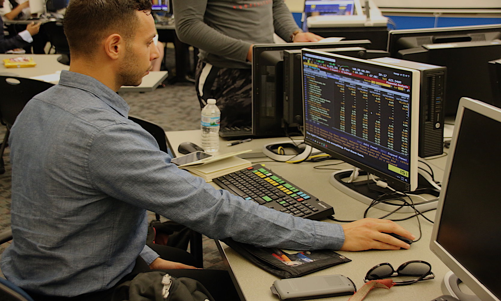 Student working on one of the Bloomberg Finance Lab has 12 Bloomberg Terminals for students to get hands on experience with the financial industry's equipment.