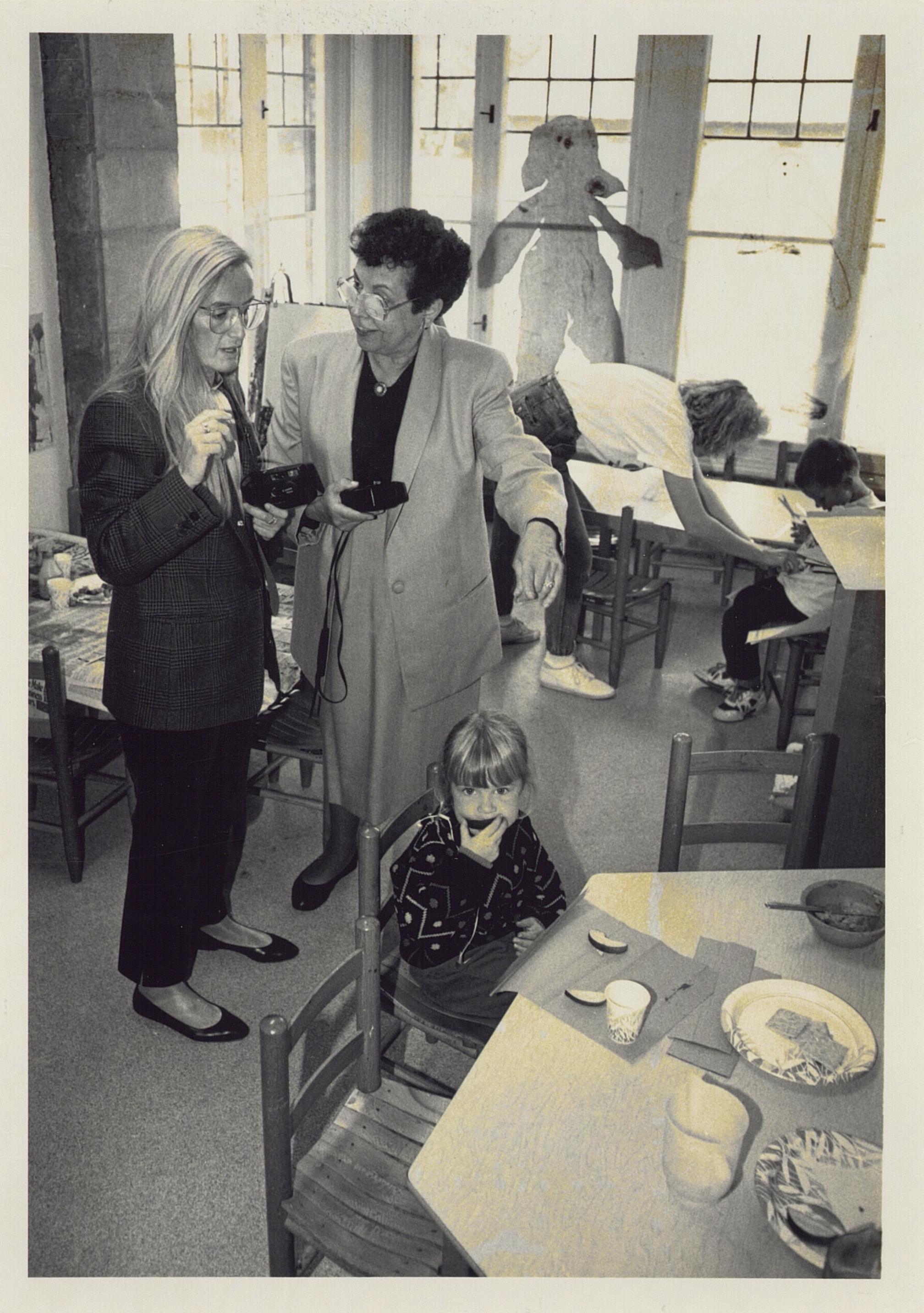 Professor Rosalyn Saltz, right, is pictured in this early 1990s photo at the campus’ Henry Ford Estate cottages, the location of the center from the late 1970s until 2008. 