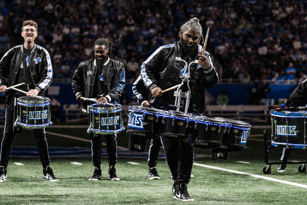 DeAndre Hicks performs on the field with the Detroit Lions Drumline during a home game against the Seattle Seahawks.
