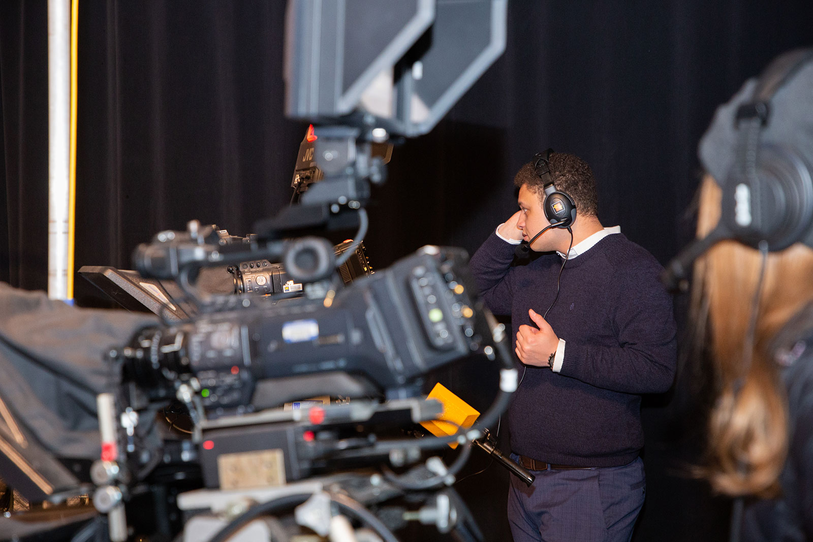 students producing a recording in the CASL media studios 