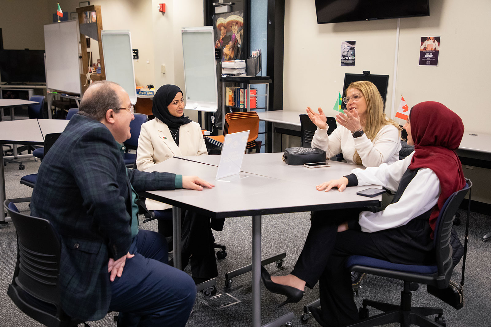 Four students having a conversation