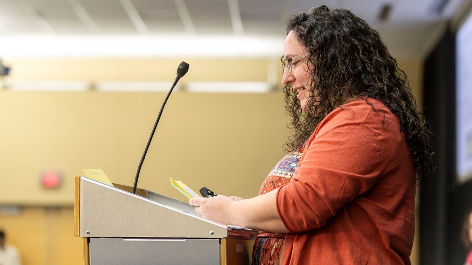 Catie Stone speaks to the crowd during the award ceremony