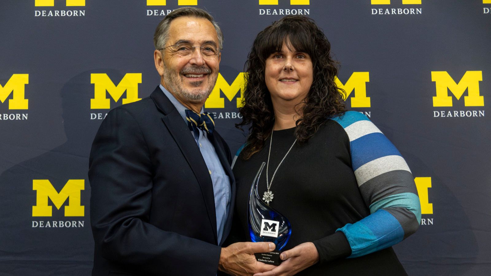 Kimberly LaPere receives her award for Student Success from Chancellor Grasso