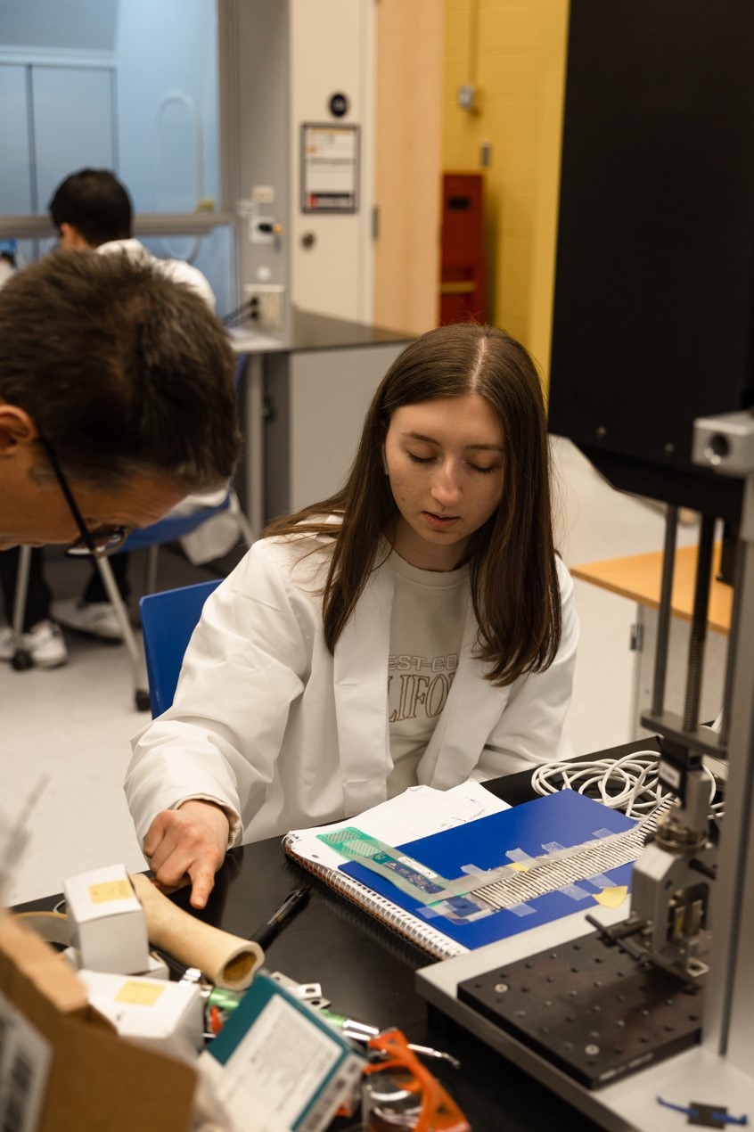 student working on assignment at the engineering lab