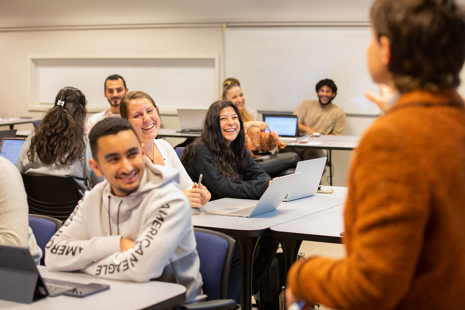 students smiling during class