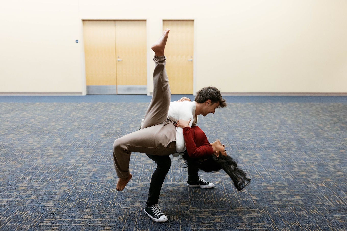 Two people dance together during a session at Swing Dearborn