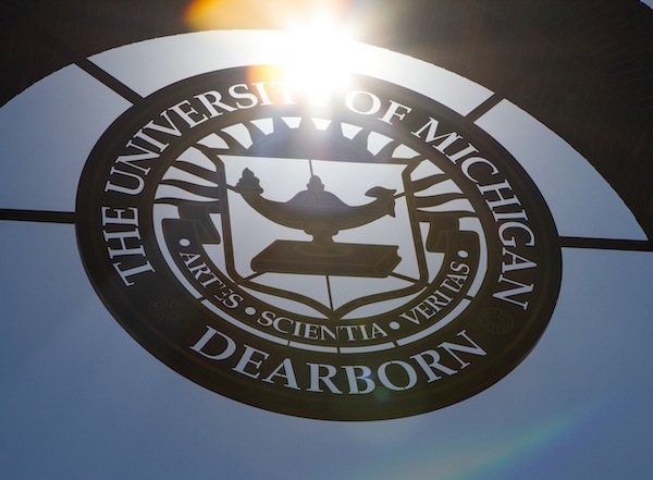 UM-Dearborn seal with sun shining through it.