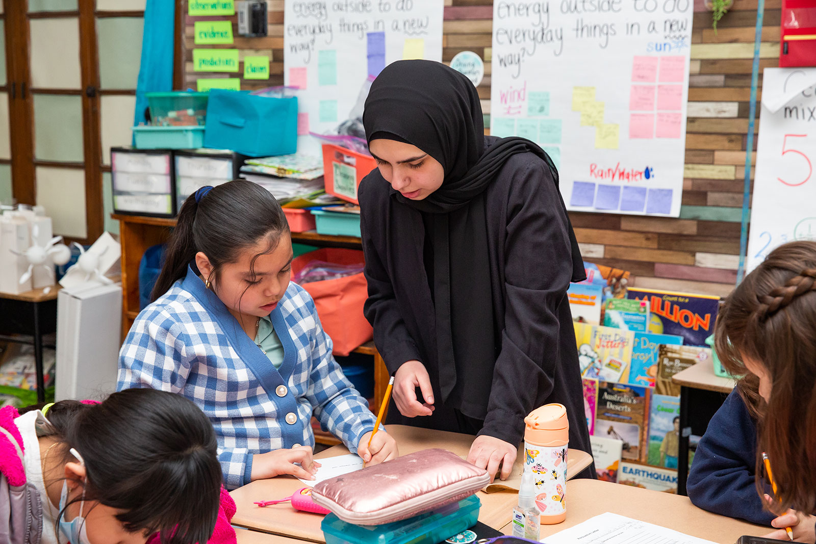 Student teacher working with a student.