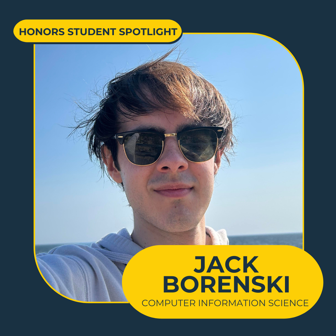Honors student Jack Borenski on the beach