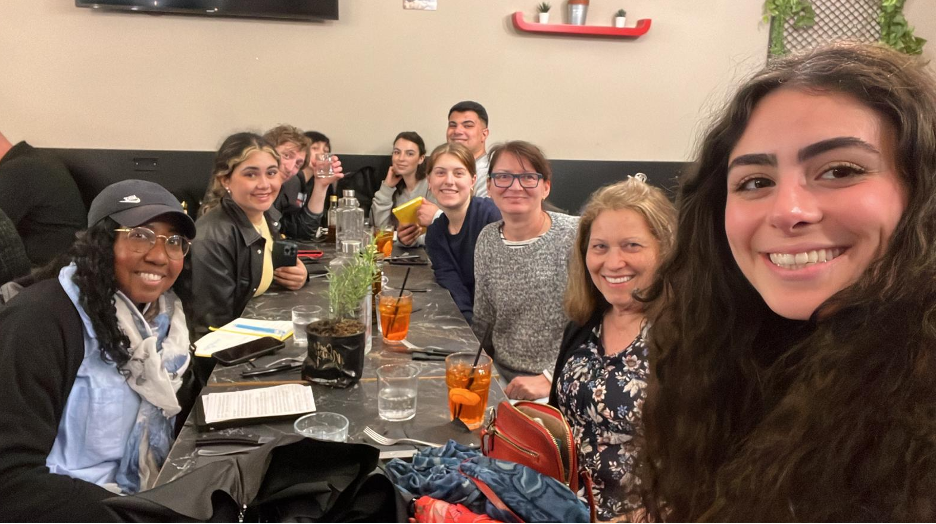 students and professor around a table in Study Abroad program, Padova, Italy, 2023