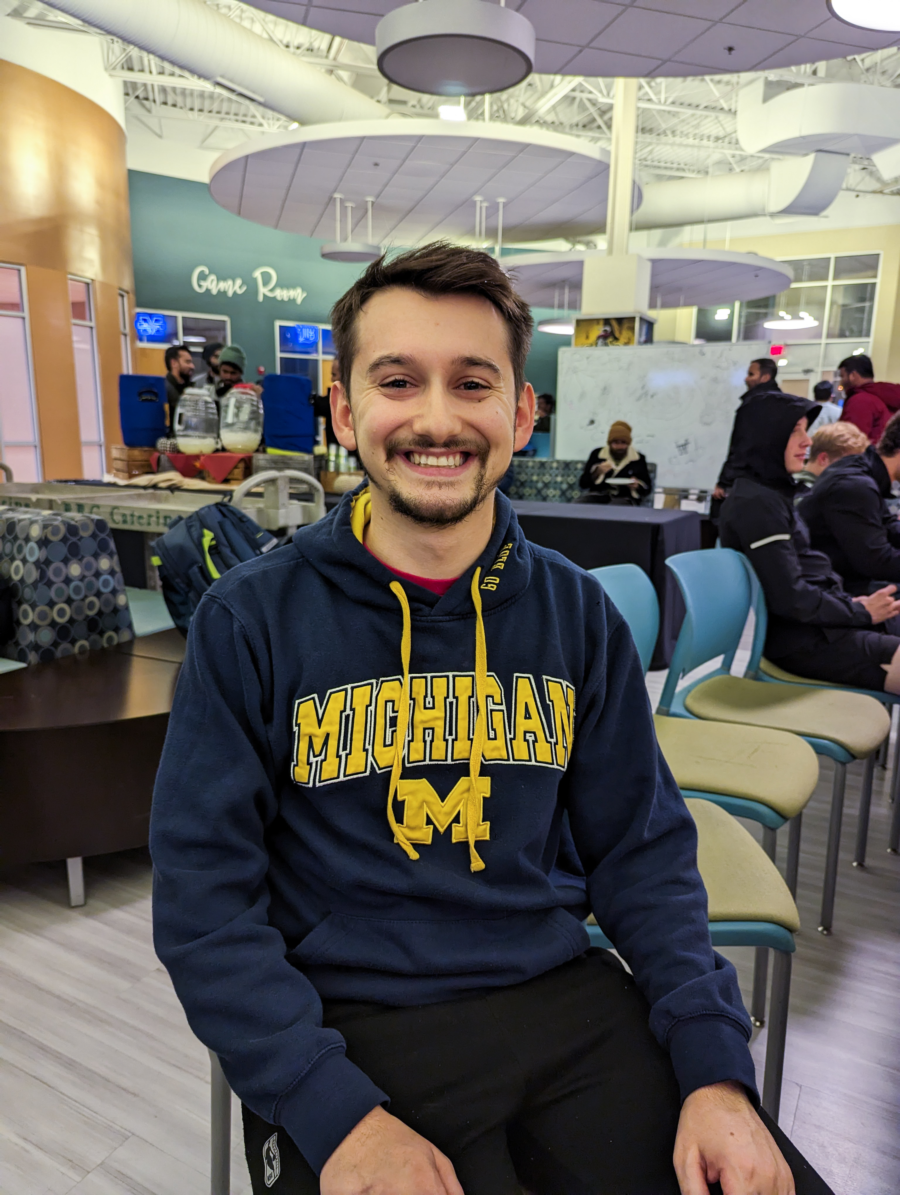 Junior Samuel Caruso poses for a photo at the 2022 UM-Dearborn Friendsgiving
