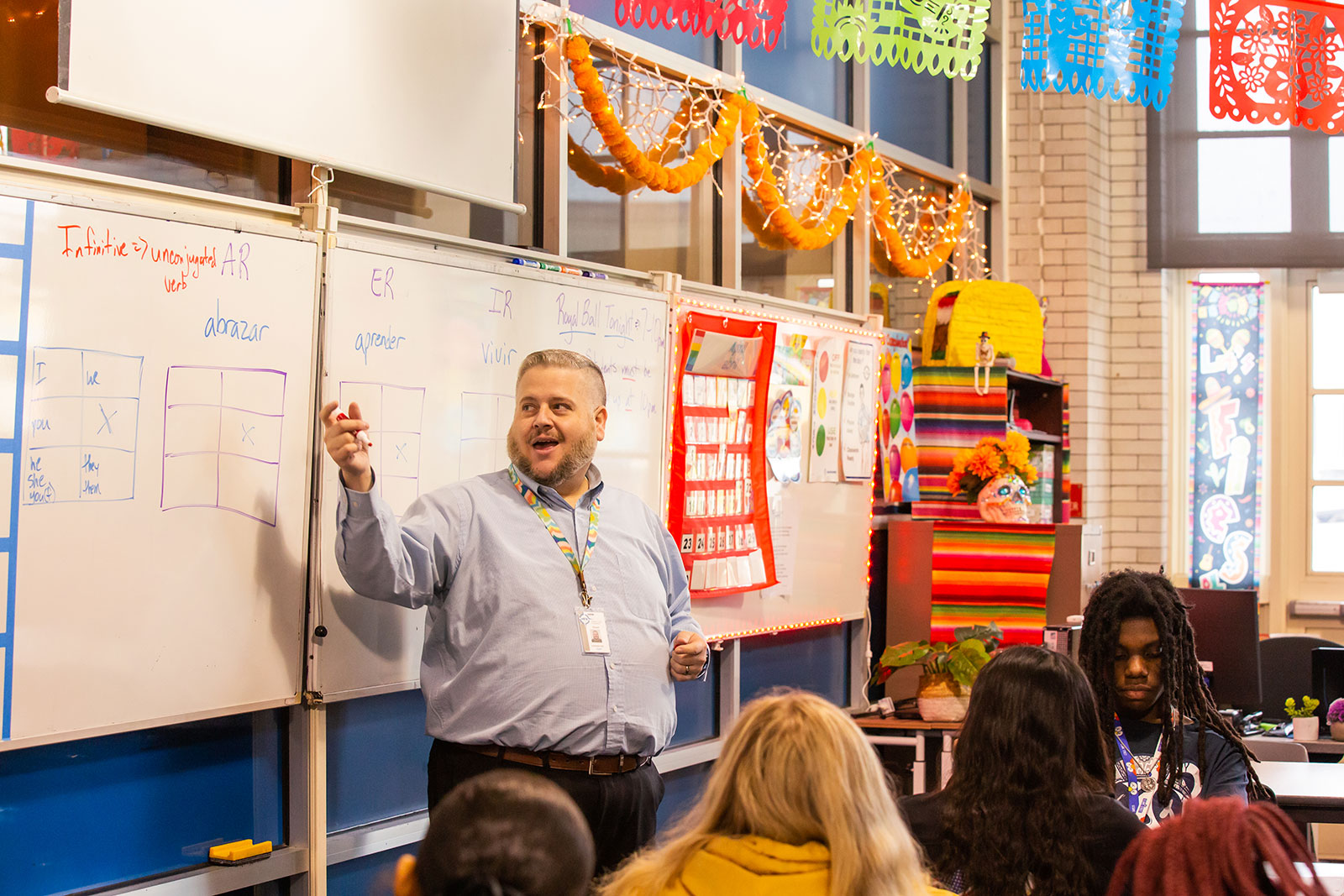 Student teacher teaching in a classroom