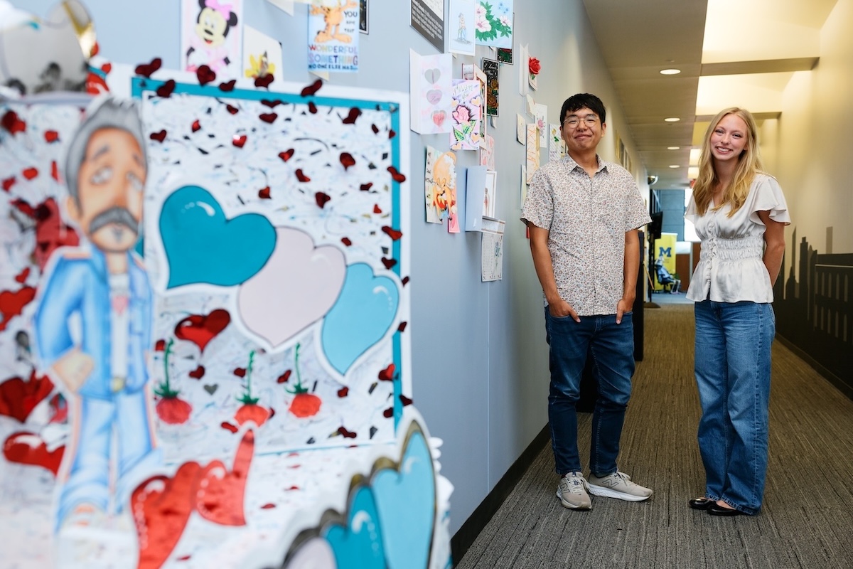 Im and Sheltraw show the exhibit, which includes hundreds of hand-drawn cards from people who are or were incarcerated.