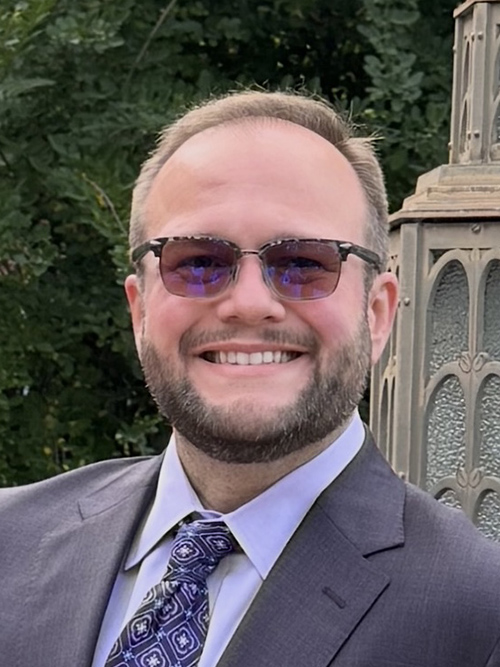 A headshot of Assistant Professor Brian Boggs