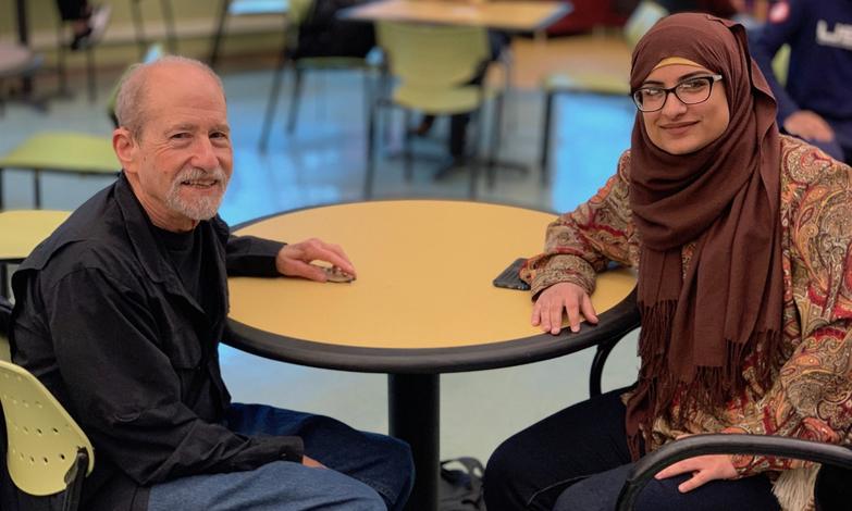 Baumgarten continues to connect with students like Raehanna Ahmed.