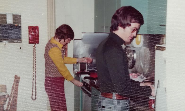 One big difference between the student experience today and Tom and Jim’s days at UM-Dearborn: They lived right on the main campus. Here's Tom cooking with his wife in their apartment on the south side of campus.