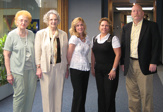 From left, Pi Omicron members Phyllis May and Dorothy Watters meet with scholarship recipients Sharlene Day and Suzette Price and CASL Dean Jerold Hale.