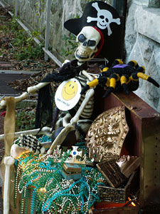 Skeleton sitting on bench at 9th annual Halloween Trick or Treat in the Gardens event