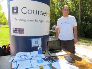 Cory Woolf mans the CourseFeeds booth at this fall's student org fair