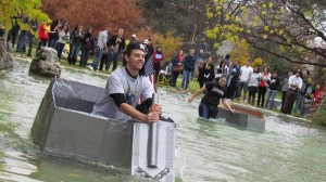 Students participate in boat races on Chancellor's Pond